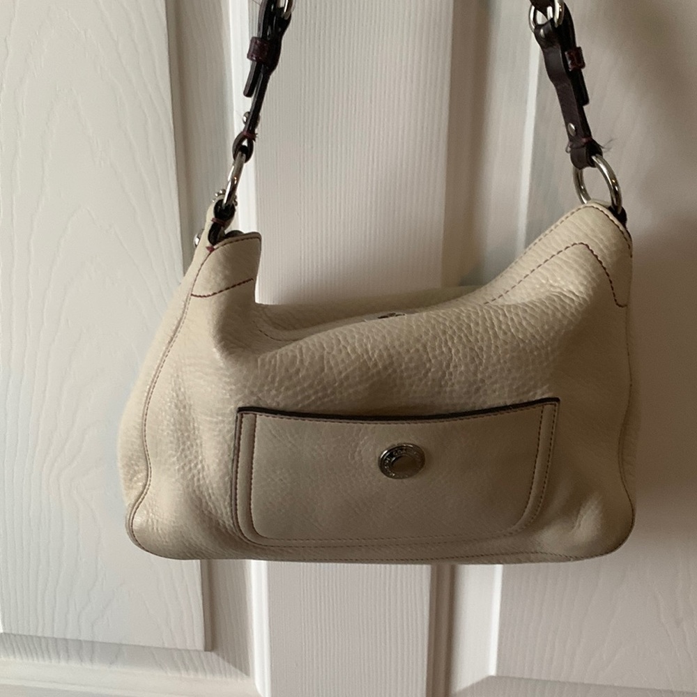 Gently used cream leather Coach purse